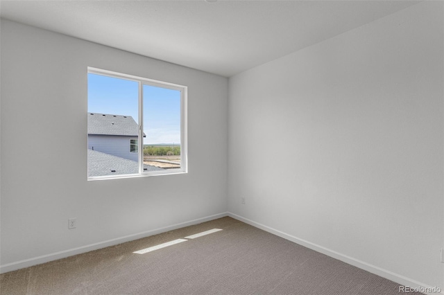 1415 Great Western Dr, Longmont, CO 80501 - carpeted empty room with baseboards
