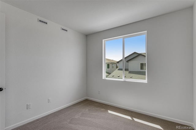 1415 Great Western Dr, Longmont, CO 80501 - carpeted spare room featuring baseboards