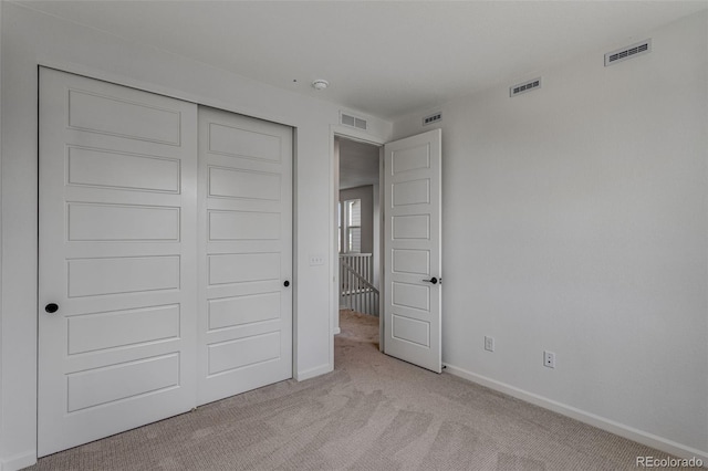 1415 Great Western Dr, Longmont, CO 80501 - unfurnished bedroom featuring light carpet, baseboards, and a closet