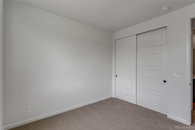1415 Great Western Dr, Longmont, CO 80501 - unfurnished bedroom with carpet floors, baseboards, and a closet