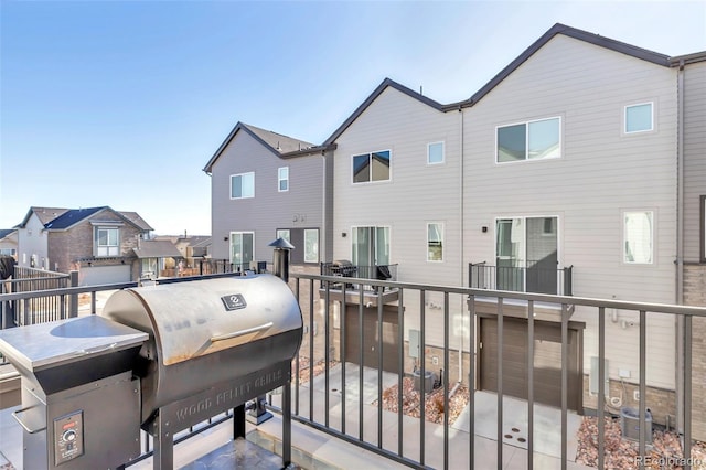 balcony featuring area for grilling