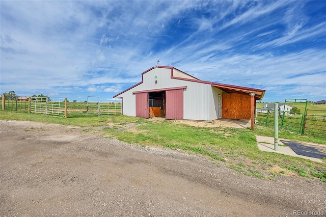 35675 Cheyenne Trl, Elizabeth, CO 80107 - view of pole building with an exterior structure and a rural view