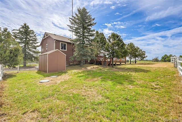 35675 Cheyenne Trl, Elizabeth, CO 80107 - view of yard with a deck and a storage shed