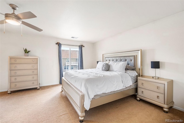 bedroom featuring light carpet, baseboards, a ceiling fan, and access to outside