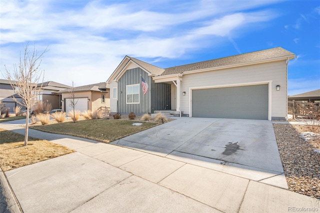 ranch-style house with a garage and a front lawn