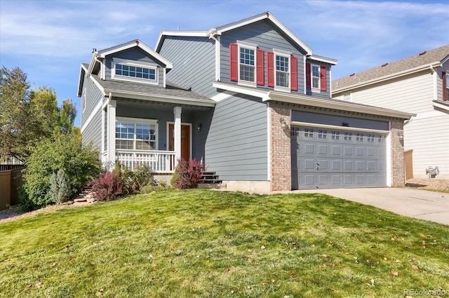 view of front facade featuring covered porch, driveway, a front lawn, and an attached garage