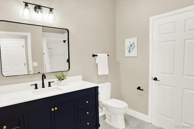 full bathroom featuring toilet, tile patterned flooring, vanity, and baseboards