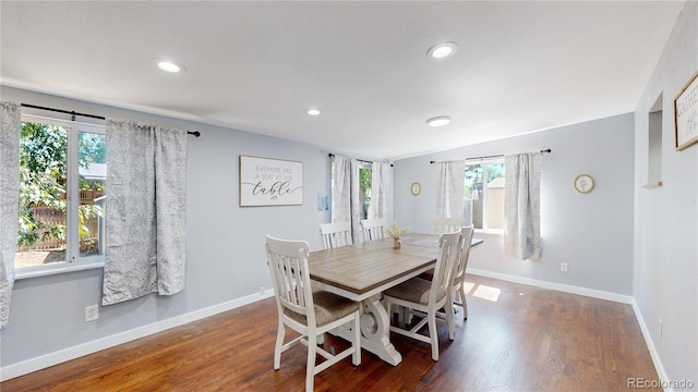 dining area with recessed lighting, dark wood finished floors, and baseboards