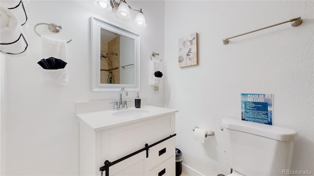 full bathroom featuring vanity and toilet