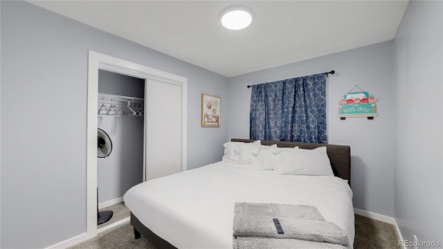 bedroom featuring a closet, carpet flooring, and baseboards