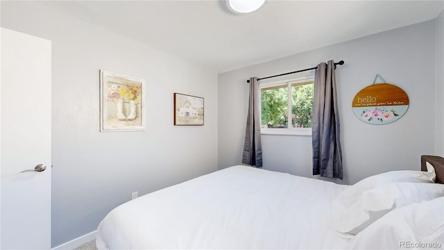 bedroom with baseboards