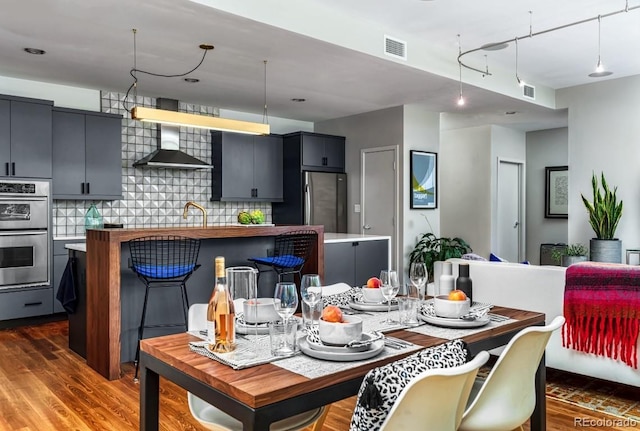 1401 Delgany St Unit 203, Denver, CO 80202 - dining space with wood finished floors