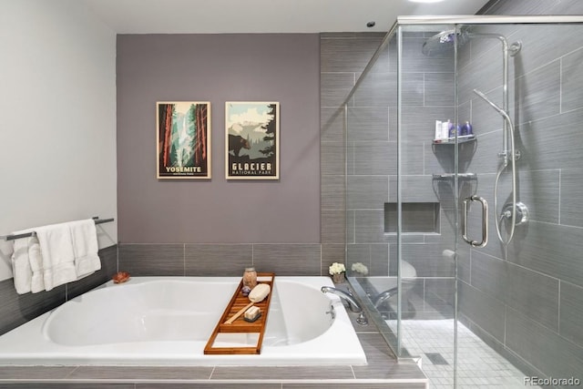 1401 Delgany St Unit 203, Denver, CO 80202 - full bathroom featuring a garden tub and a shower stall