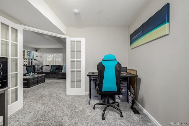 office space featuring french doors and carpet flooring