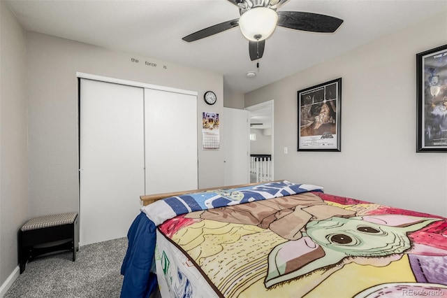 bedroom with carpet floors, a closet, and ceiling fan