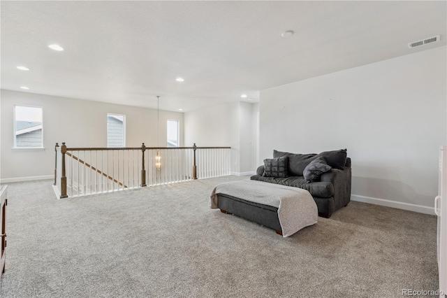 6616 Amur Ln, Castle Rock, CO 80108 - living area with an upstairs landing, carpet, recessed lighting, and baseboards