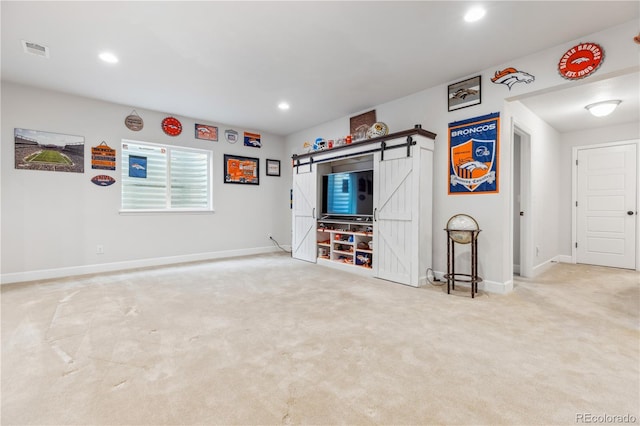 6616 Amur Ln, Castle Rock, CO 80108 - unfurnished living room featuring a barn door, carpet floors, baseboards, and recessed lighting