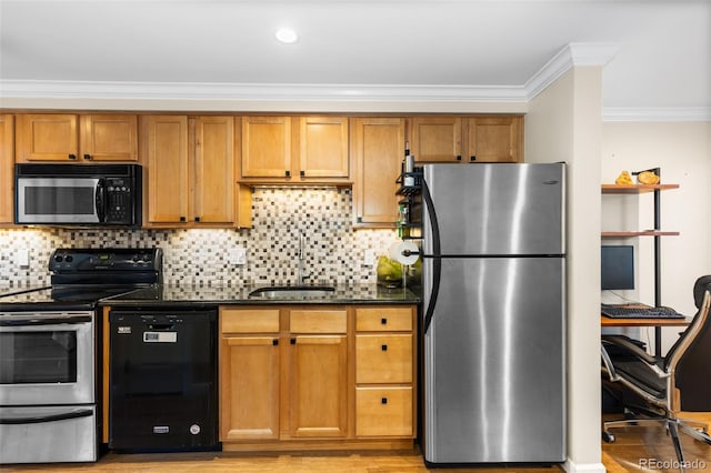 kitchen featuring decorative backsplash, sink, black appliances, and ornamental molding