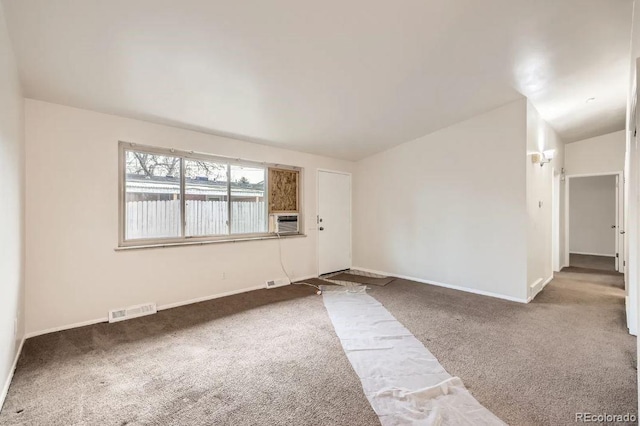 4585/4587 E Yale Ave, Denver, CO 80222 - unfurnished room with carpet, baseboards, lofted ceiling, and cooling unit