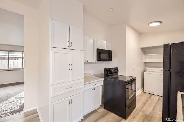4585/4587 E Yale Ave, Denver, CO 80222 - kitchen featuring washer / clothes dryer, black appliances, white cabinetry, and light wood-type flooring