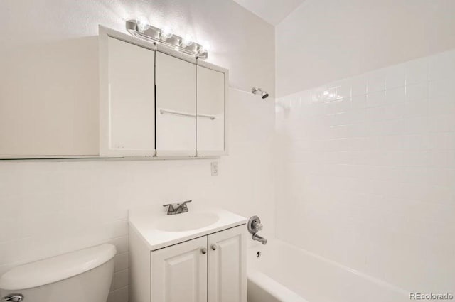 4585/4587 E Yale Ave, Denver, CO 80222 - bathroom featuring vanity, toilet, and shower / bath combination