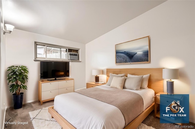 4585/4587 E Yale Ave, Denver, CO 80222 - bedroom with light carpet, vaulted ceiling, baseboards, and a wall mounted air conditioner