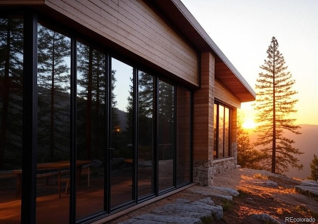 view of property exterior at dusk