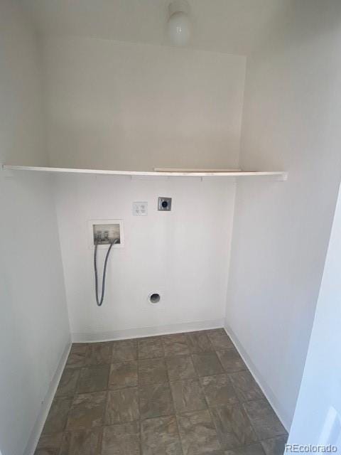 clothes washing area with washer hookup and electric dryer hookup