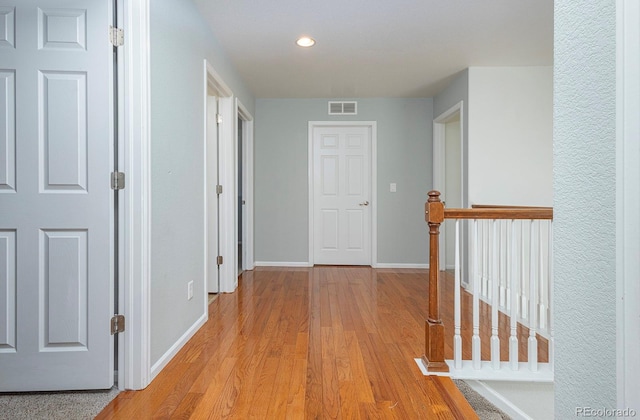 hall featuring light hardwood / wood-style floors