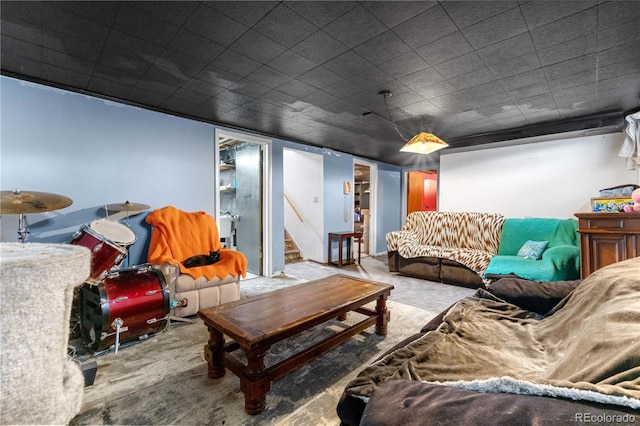 living area featuring stairway