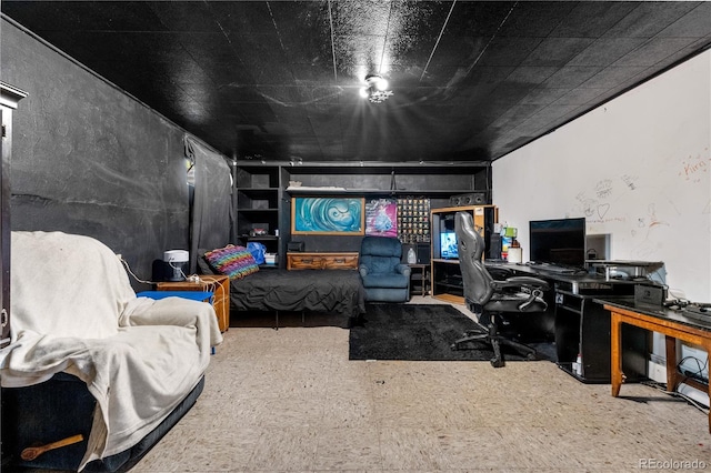 home office with tile patterned floors