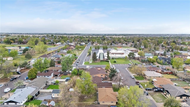 aerial view of property's location featuring nearby suburban area