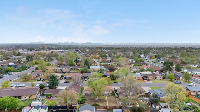 aerial perspective of suburban area with a mountain backdrop