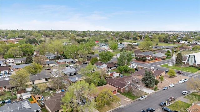 aerial view of property's location with nearby suburban area