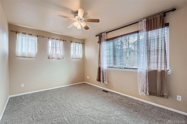4037 S Odessa Cir, Aurora, CO 80013 - carpeted empty room with a ceiling fan, baseboards, and visible vents