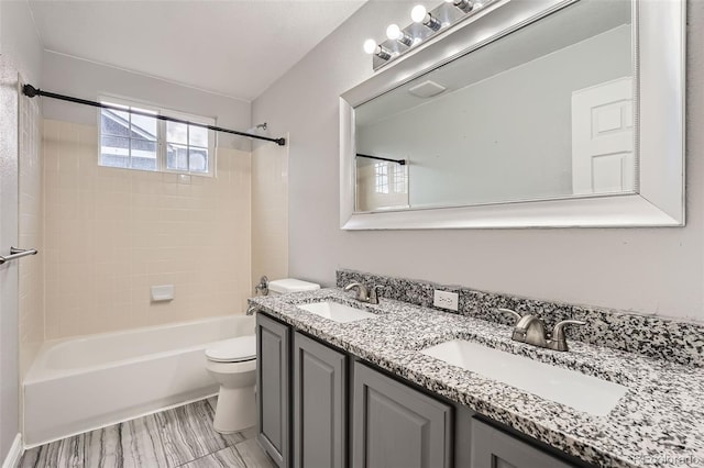 4037 S Odessa Cir, Aurora, CO 80013 - bathroom featuring a sink, shower / bathing tub combination, toilet, and double vanity