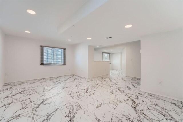 4037 S Odessa Cir, Aurora, CO 80013 - unfurnished room with recessed lighting, visible vents, and marble finish floor