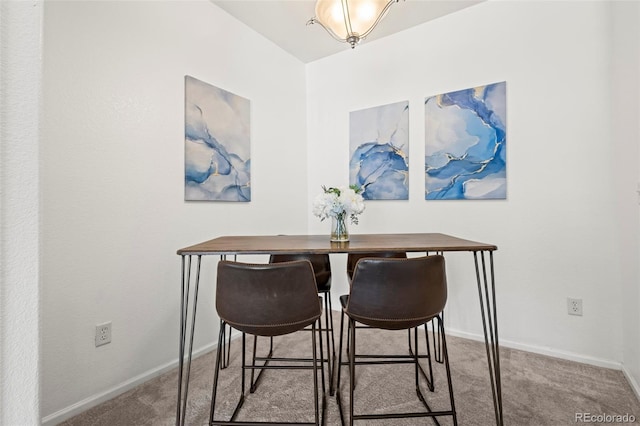 4451 S Ammons St Unit 4-203, Littleton, CO 80123 - dining room with carpet and baseboards
