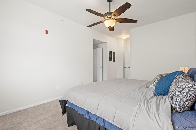 4451 S Ammons St Unit 4-203, Littleton, CO 80123 - carpeted bedroom with baseboards and a ceiling fan