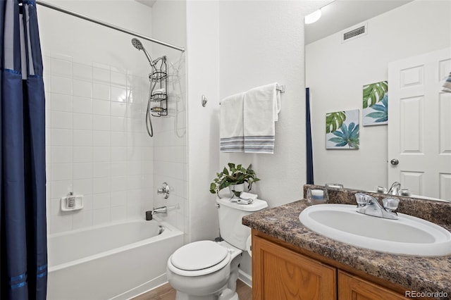 4451 S Ammons St Unit 4-203, Littleton, CO 80123 - bathroom featuring shower / bath combination with curtain, vanity, and wood finished floors