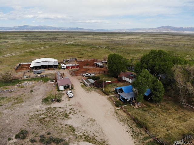 bird's eye view with a rural view and a mountain view