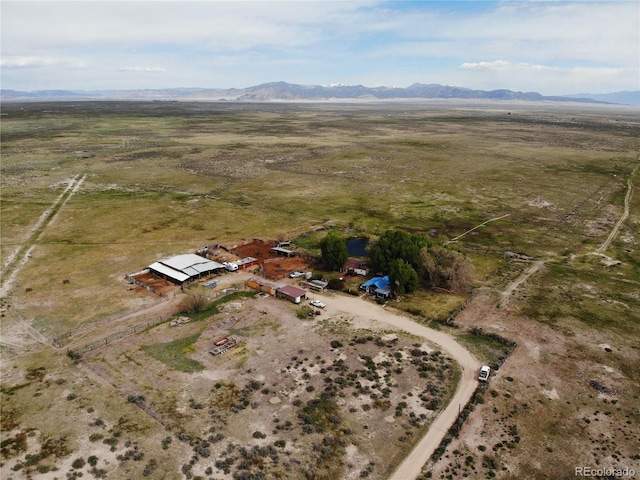 bird's eye view with a rural view and a mountain view