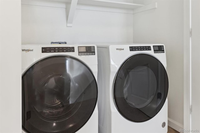 washroom with separate washer and dryer