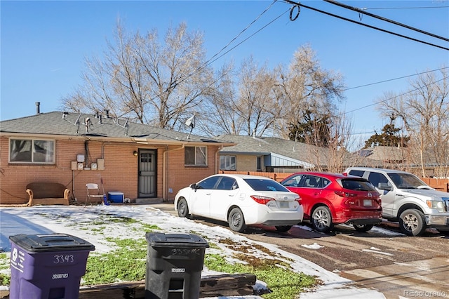 view of front of house with brick siding