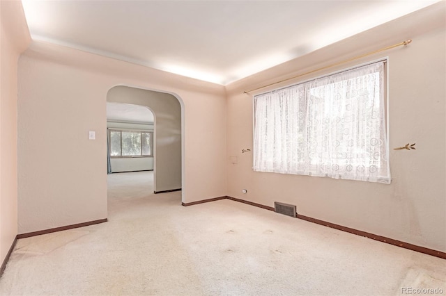 10841 Montview Blvd, Aurora, CO 80010 - carpeted spare room with arched walkways and baseboards
