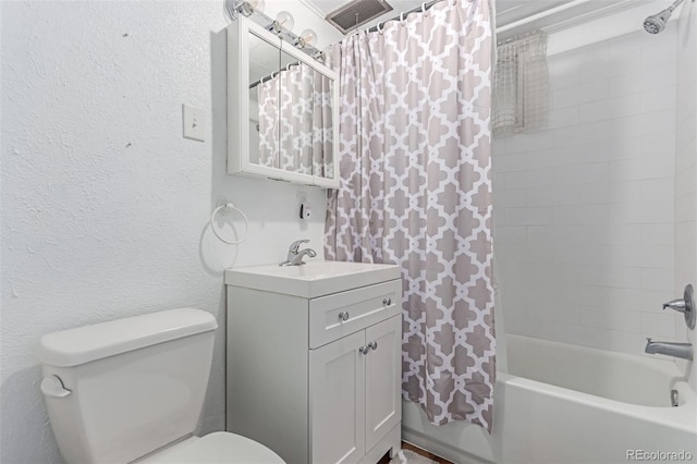 10841 Montview Blvd, Aurora, CO 80010 - bathroom featuring vanity, shower / bath combo, and a textured wall