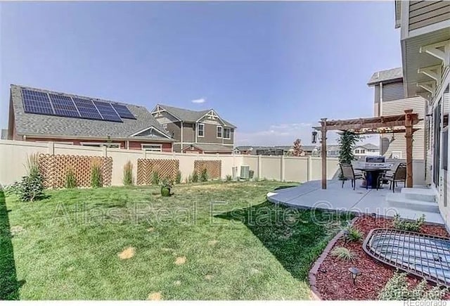 view of yard with cooling unit, a pergola, and a patio area