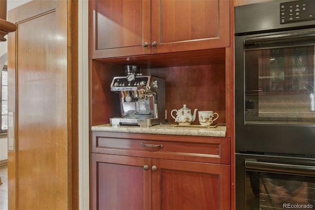 bar featuring dobule oven black