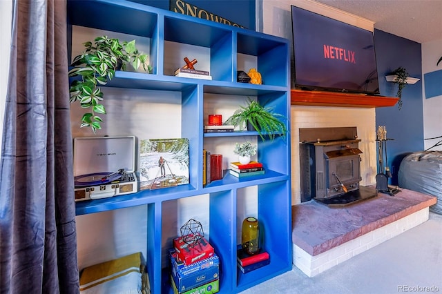 details with a textured ceiling and carpet