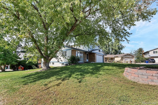 view of yard with a garage